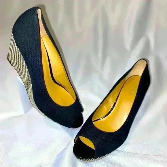 Nine West | Cheerful | Platform Wedge |
Navy Blue Canvas | Peep Toe - Picture 2 of 5